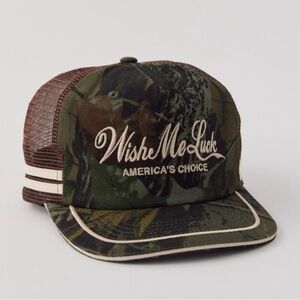 Urban Outfitters • Wish Me Luck - Camo Trucker Hat with Embroidery sold